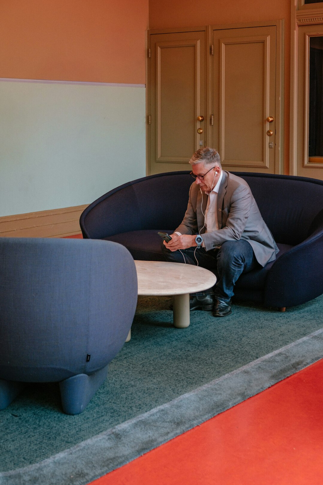 person reading book in quiet room